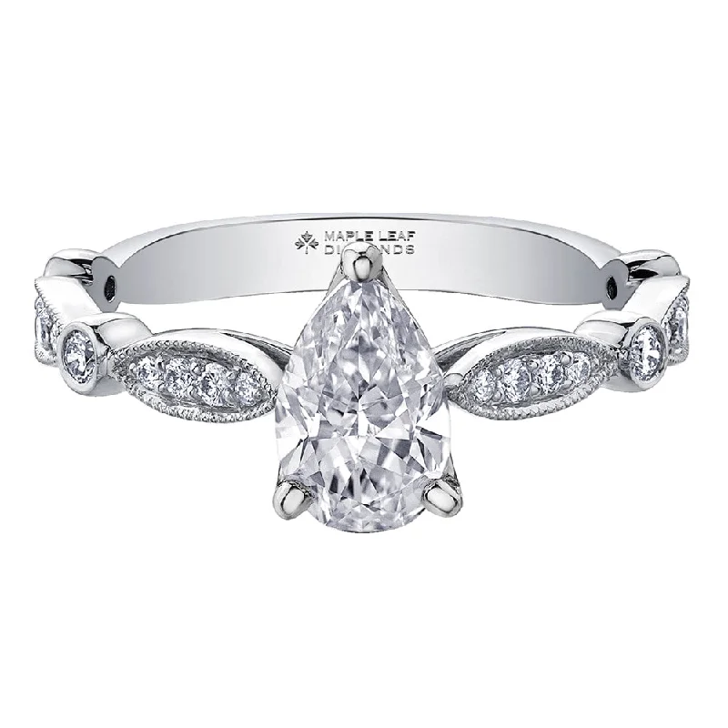 Cathedral - Style Women's Diamond Rings with a Raised Center Setting and Elaborate MetalworkPear-Shaped Canadian Diamond Solitaire Ring