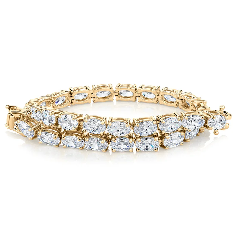 Bangle Bracelets with Celtic Knotwork for a Symbolic and Stylish LookOval tennis bracelet with 12.04 carats* of diamond simulants in 10 carat yellow gold