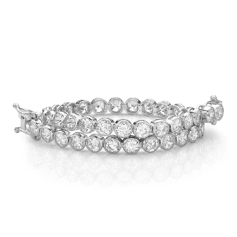 Solid Gold Bangles with Intricate Floral Engravings for a Luxurious LookRound Brilliant tennis bracelet with 9.25 carats* of diamond simulants in 10 carat white gold