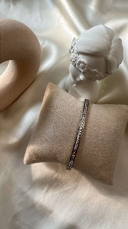 Boho - Style Bangle Bracelets with Feather and Bead EmbellishmentsIcy silver bangle