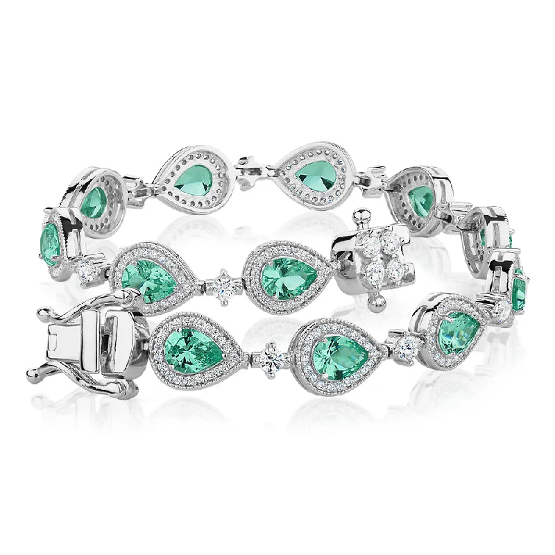 Bangle Bracelets with LED Lights for a Glowing and Trendy AccessoryPear and Round Brilliant tennis bracelet with ocean green simulants and 1.50 carats* of diamond simulants in sterling silver