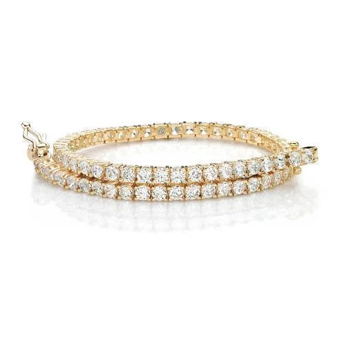 Adjustable Bangle Bracelets with Magnetic Closures for Easy Wear and RemovalRound Brilliant tennis bracelet with 4.38 carats* of diamond simulants in 10 carat yellow gold