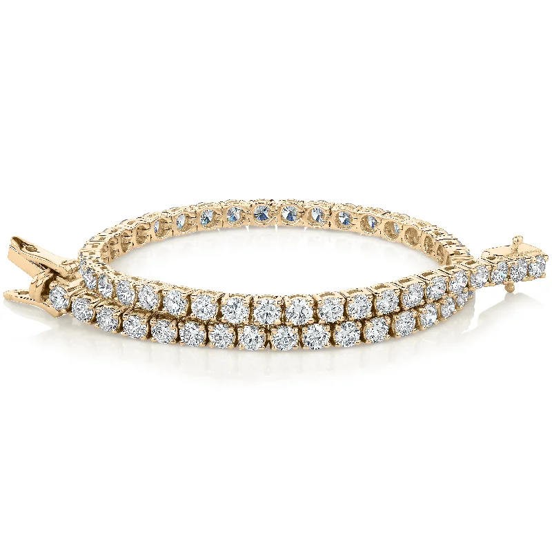 Clear Crystal - Embellished Bangles for a Sparkling and Elegant AppearancePremium Laboratory Created Diamond, 5 carat TW round brilliant tennis bracelet in 18 carat yellow gold