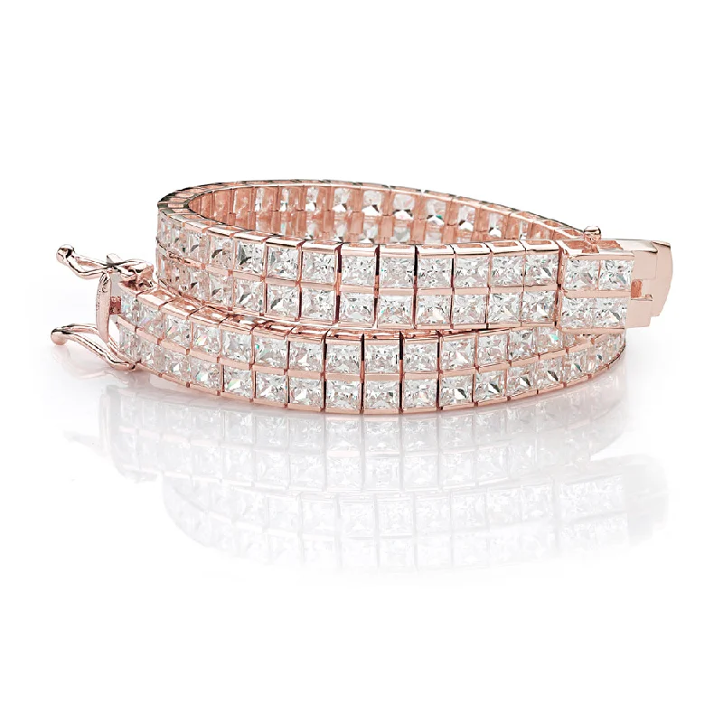 Leather - Wrapped Bangles with Studded Details for a Rock - Chic VibePrincess Cut tennis bracelet with 22.68 carats* of diamond simulants in 10 carat rose gold