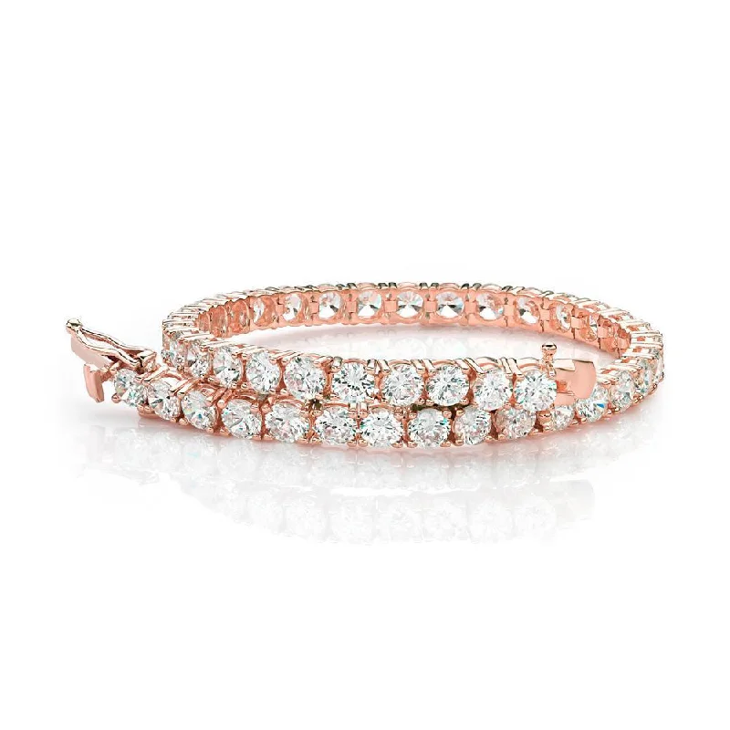 Bangle Sets with Mix - and - Match Patterns for a Versatile AccessoryRound Brilliant tennis bracelet with 12 carats* of diamond simulants in 10 carat rose gold