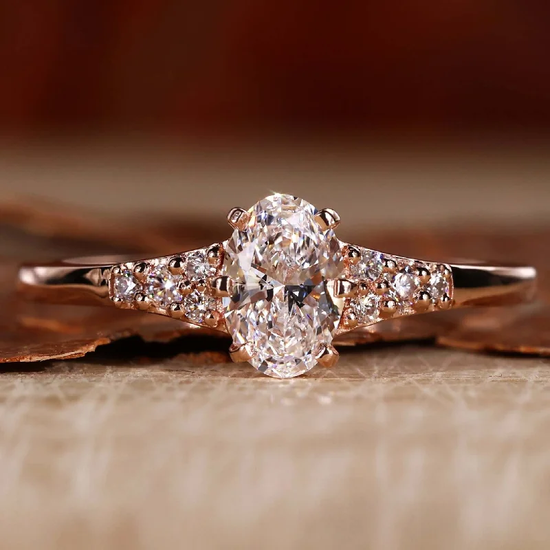 Marquise Cut Engagement Rings with a Channel - Set Diamond Band0.55 CT Oval Cut Lab Grown Diamond Muse Engagement Ring