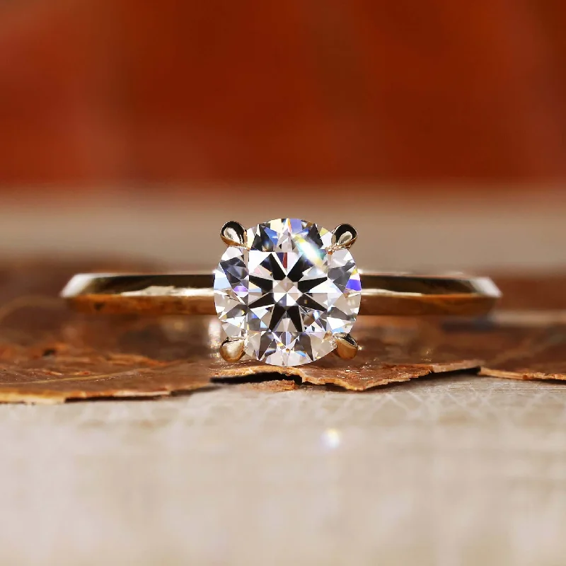 Cathedral - Style Engagement Rings with a Raised Center Stone and Intricate Metalwork0.92 CT Round Lab Grown Diamond Solitaire Engagement Ring