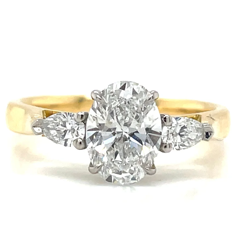 Solitaire Engagement Rings with a High - Clarity Round Diamond and Tapered BandDaniela - 18ct Yellow Gold 1.27ct Laboratory Grown Oval Three Stone Engagement Ring with Side Pear Diamonds