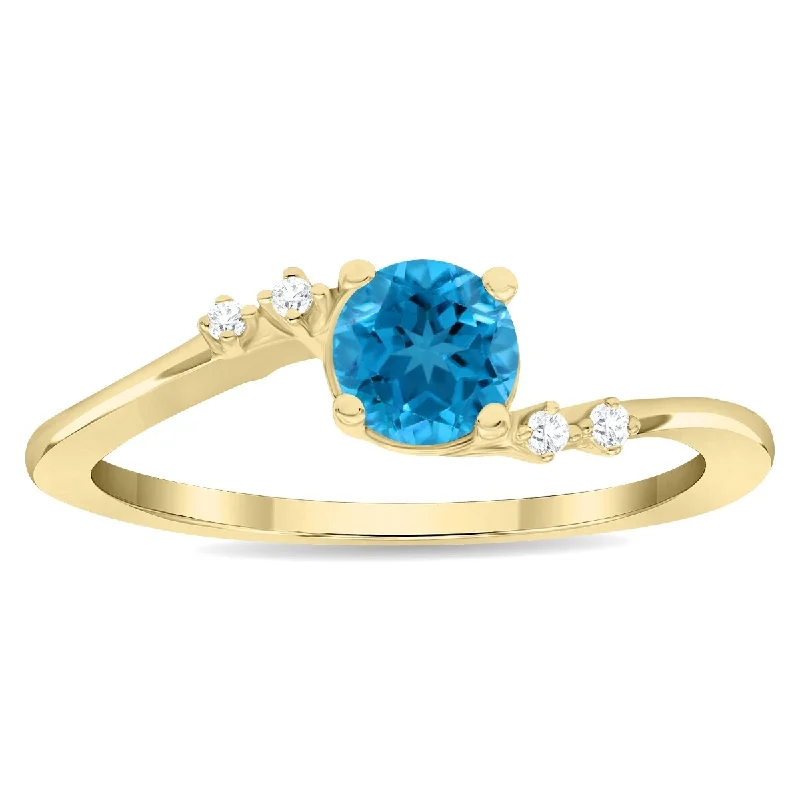 Emerald Gemstone Rings Set in Platinum with Filigree Work for a Vintage - Inspired LookWomen's Round Shaped Blue Topaz and Diamond Tierra Ring in 10K Yellow Gold